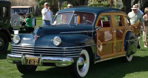 a teal and wood paneled 1942 Chrysler Town and Country