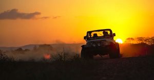 Custom Jeep off-roading at sunset