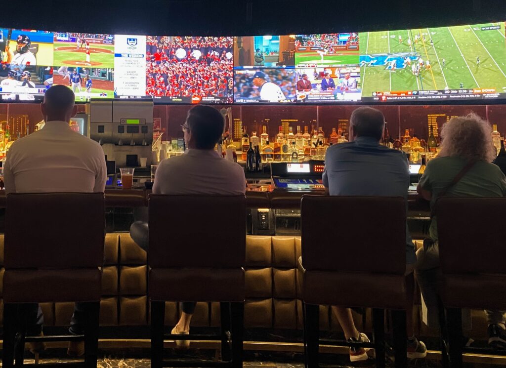 a sports bar filled with tv